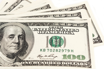 One hundred dollars close up with a portrait, selective focus