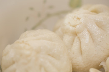 Fototapeta na wymiar Steamed chinese bun closeup