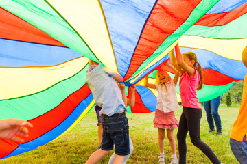 Large colorful cloth covered group of friends