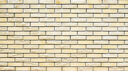 Obraz premium yellow misty brick wall for background or texture