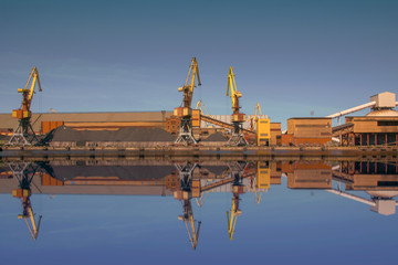 Fototapeta na wymiar Baltic sea port big colorful crane ready for work! 