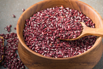 azuki beans , red beans on wood background

