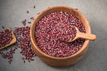 azuki beans , red beans on wood background


