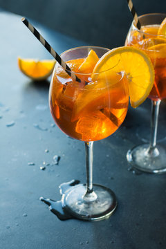 Classic italian aperol spritz cocktail on dark.