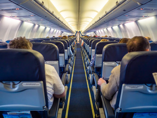 Saloon aircraft with passengers during the flight.