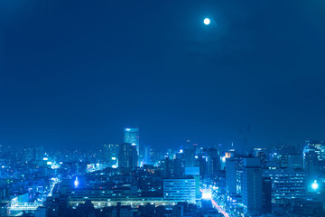 Fototapeta na wymiar Light from the busy city at night.