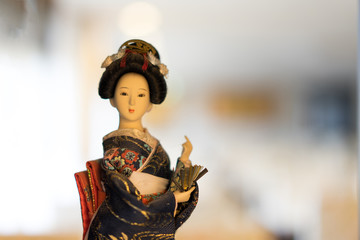 Obraz premium Japanese girl doll in national costume beautiful face