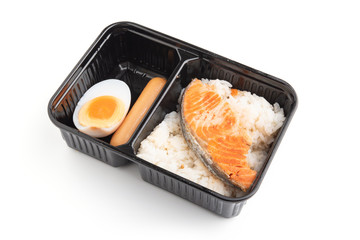 Roasted salmon fillets with rice. Isolated on a white background.