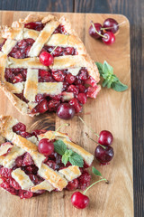 Cherry pie on the wooden board