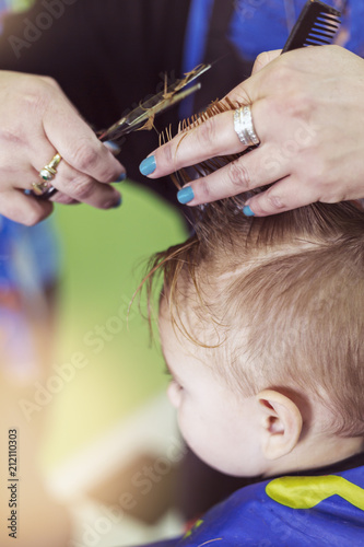 First Haircut Scissors Length Of Little Boy S Hair Stock Photo