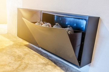A modern design of shoe boxes for storage the shoes in hotel
