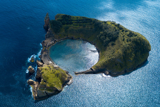 Island with round lagoon in center