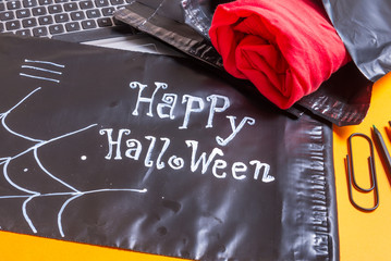Fototapeta na wymiar Black polythene envelope, Happy Halloween concept