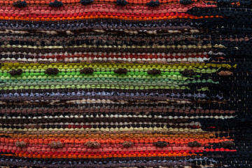 Homespun carpet, colored stripes