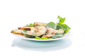 Fried zucchini in a white plate
