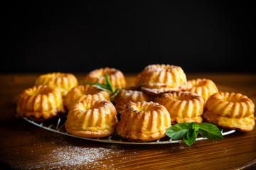 sweet muffin curd in sugar powder