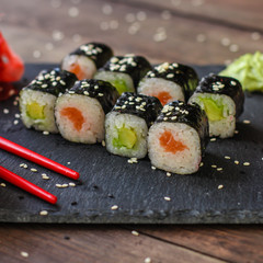 sushi rolls and sushi maki (a portion of sushi) - Sushi menu. Japanese food. food background
