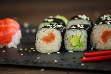 sushi rolls and sushi maki (a portion of sushi) - Sushi menu. Japanese food. food background