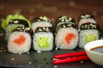 sushi rolls and sushi maki (a portion of sushi) - Sushi menu. Japanese food. food background