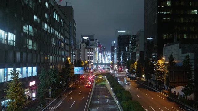 Tokyo street view and city traffic at night - TOKYO / JAPAN - JUNE 12, 2018