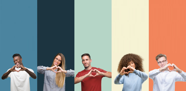 Group of people over vintage colors background smiling in love showing heart symbol and shape with hands. Romantic concept.