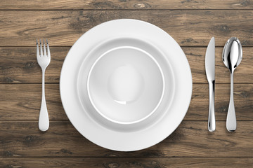 clean dinner ware on wooden table