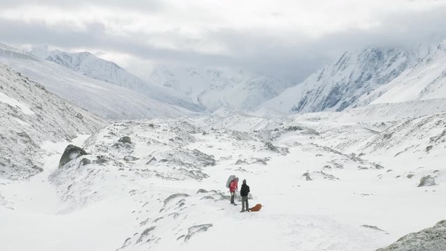 Backpackers on Larke Pass in Nepal, 5100m altitude. Manaslu circuit trek area.