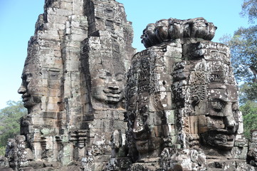 Fototapeta na wymiar The Bayon is a well-known and richly decorated Khmer temple at Angkor in Cambodia. Built in the late 12th or early 13th century as the official state temple of the Mahayana Buddhist King Jayavarman VI