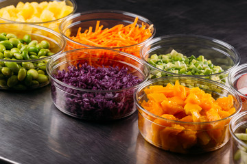 Bowls with cu cooking ingredients