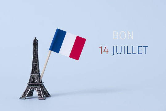 text bon 14 juillet, happy 14 july in French.