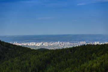 Fototapeta na wymiar View of Krasnoyarsk, Russia, city and the administrative center of Krasnoyarsk Krai, Russia, located on the Yenisei River.