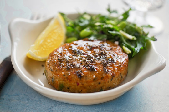 Thai Style Fish Cakes With Spicy Soy Glaze, Green Salad And Lemon Wedge 