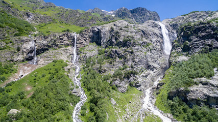 waterfalls from the mountain on a clear day