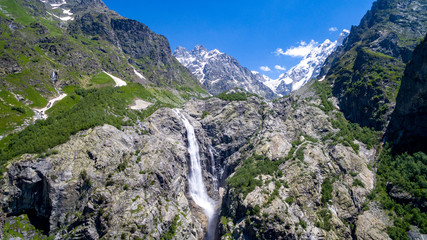 high waterfall in the mountains of Georgia