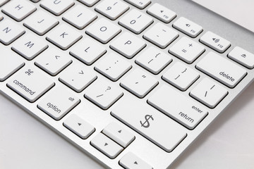 White  keyboard with white $ "DOLLAR" key.