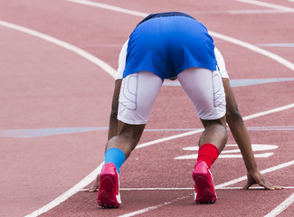Fototapeta premium Sprinter in set position at race start