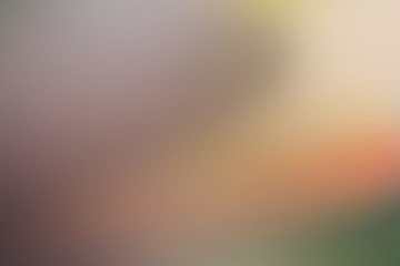 abstract blurred background in brown, orange, green color
