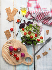 beautifully served fresh vegetable salad on a wooden table