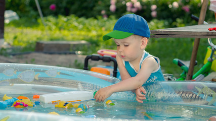 The boy plays in the playground