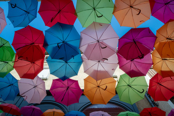 Multi-Coloured Street Umbrellas hanging in Carcassonne. South France. Summertime. 
