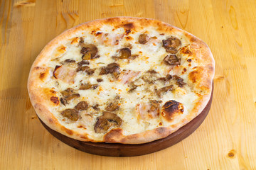 Pizza with mushrooms and ham