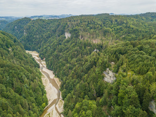 Fototapeta na wymiar Aerial view of wild Sense river in Fribourg, Switzerland