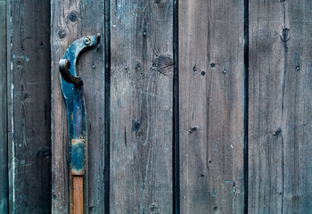 Wood background texture of smooth wooden boards scored and stained with age, natural light, copy space, closeup,