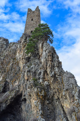 The tower complex of Vovnushki, Ingushetia. Ancient settlement. Tower on rock cliff