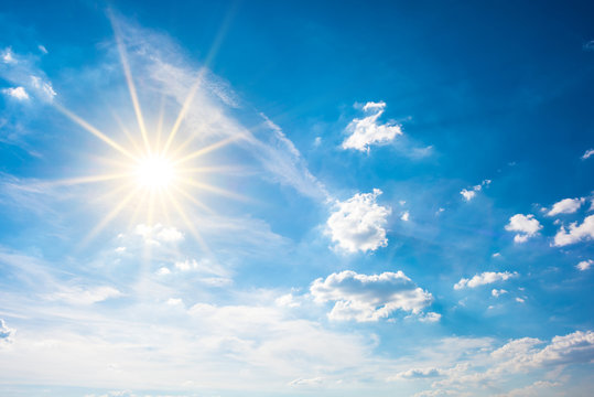 Summer background, wonderful blue sky with bright sun