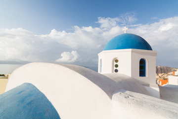 Details of a traditional Greek orthodox blue dome church, Santorini, Greece