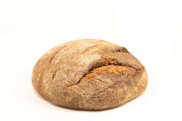 Delicious round rye bread isolated on a white background.Whole fresh healthy baked goods.Useful for vegans.