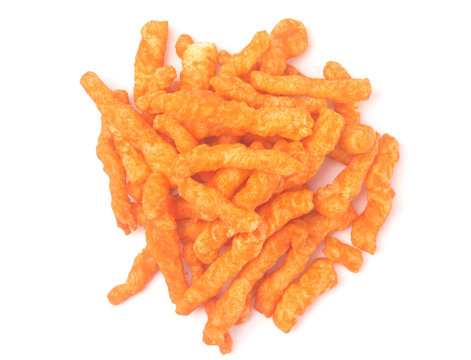 Fototapeta Long and Thing Crunchy Orange Cheesy Chips on a White Background