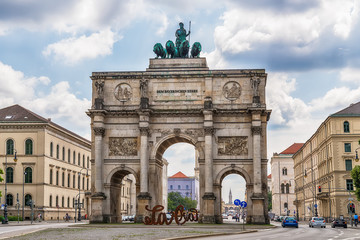 Fototapeta na wymiar Munich, Germany - June 09, 2018: Siegestor - the triumphal arch. It was commissioned by King Ludwig I of Bavaria and completed in 1852. Dedication on the frieze means 'To the Bavarian army'.