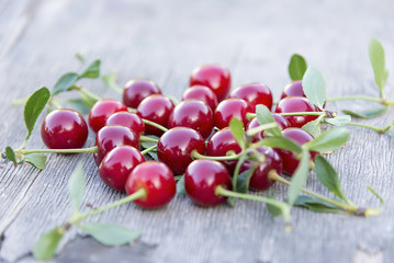 cherry on a wooden table